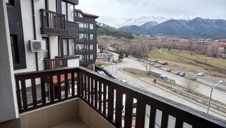 Стилен тристаен апартамент с панорамна гледка в Банско Стилен тристаен апартамент с панорамна гледка в Банско